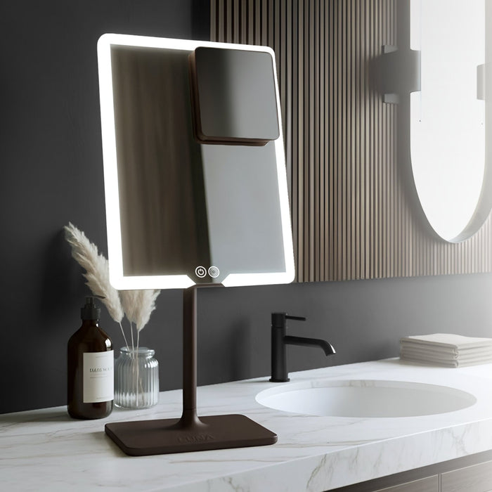 Espresso Brown ORBIT LED makeup mirror lit on a marble bathroom counter