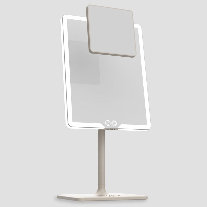 ORBIT Soft Stone LED vanity mirror angled front view on stand